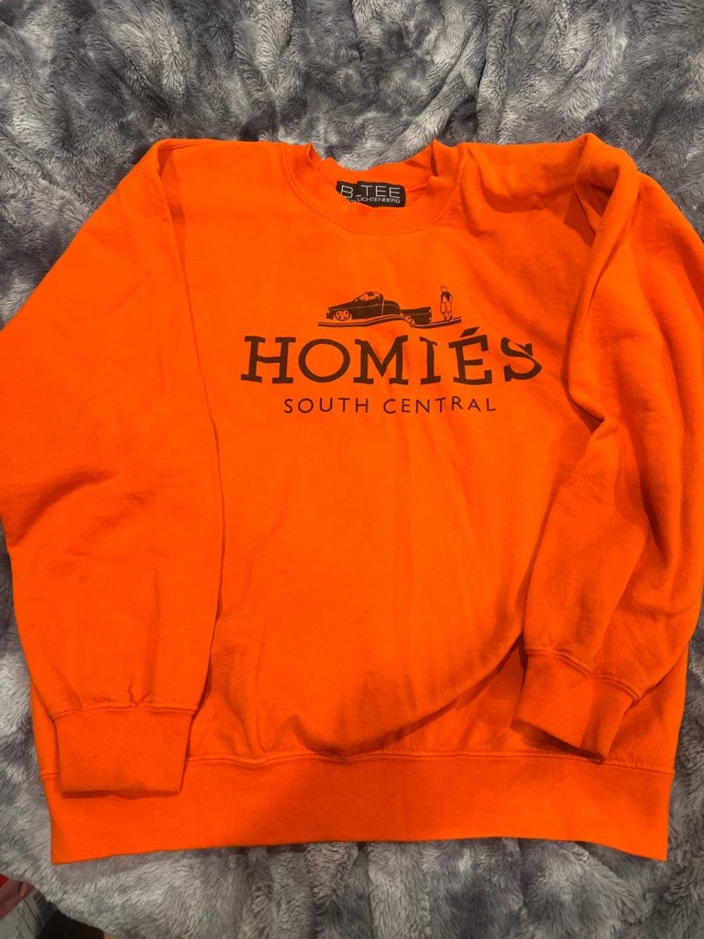 Homie Orange Crewneck Sweatshirt with Black 'HOMIÉS South Central' Print